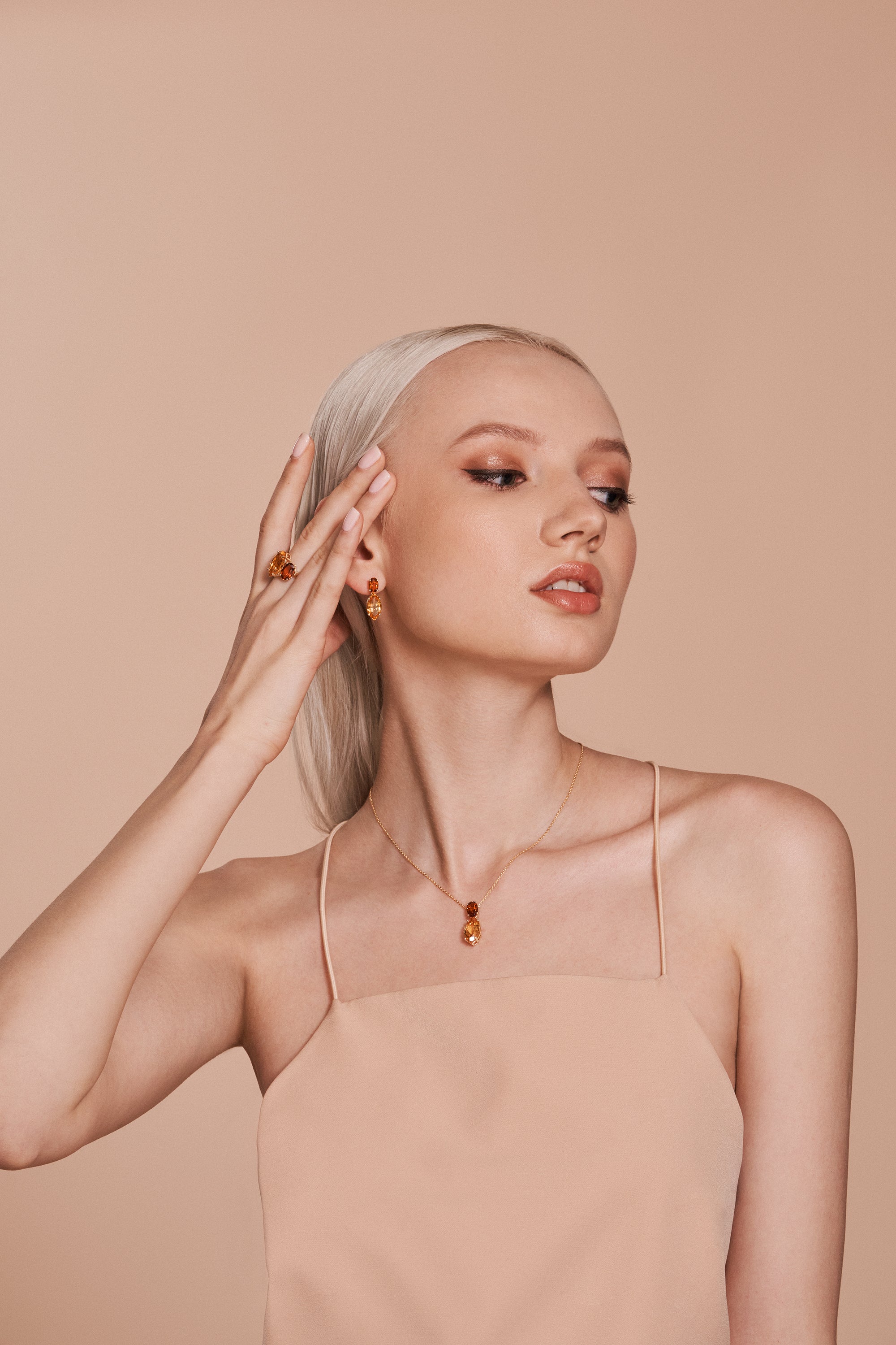 gemma_sunset_earrings_14k_yellow_gold_on_model_2